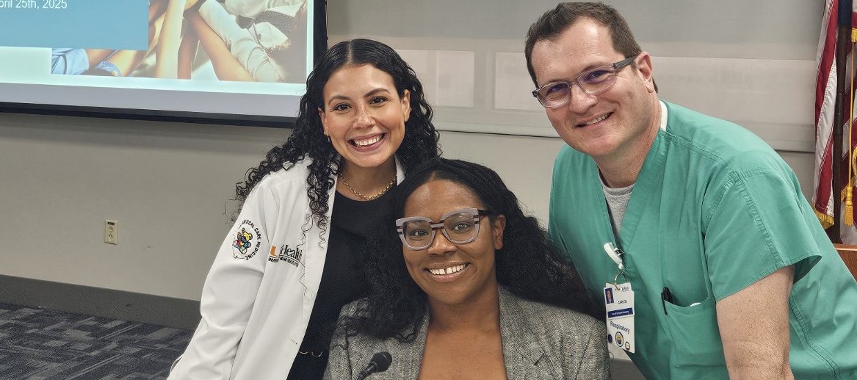 Dr. Frances Rodriguez-Ramos with two of the panelists, Angelica Jean Pierre and Carlos Gonzalez. 