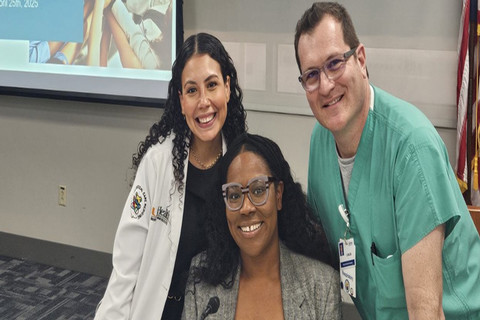 Dr. Frances Rodriguez-Ramos with two of the panelists, Angelica Jean Pierre and Carlos Gonzalez. 
